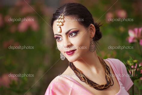 Beautiful Indian Girl In The Indian National Dress On Greenhouse Stock