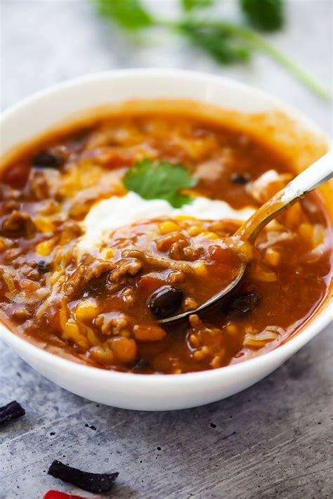 Use ground beef or ground turkey in this great tasting soup. Crock Pot Taco Soup is a flavorful soup filled with beans ...