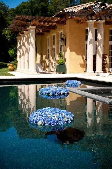 Floating arrangements are an ideal way to get maximum impact with a minimal investment. 34 best floating flowers in pools images on Pinterest ...