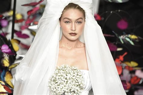 Watch Gigi Hadid Shows Off Ethereal Wedding Dress ‘carried By Butterflies