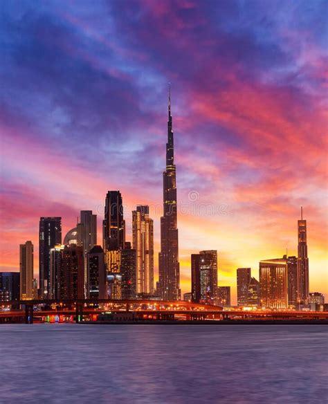 Dubai Skyline With Beautiful Sunset Color And City Lights Stock Image