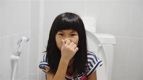 Asian Girl Using Toilet At Home Stock Footage Video