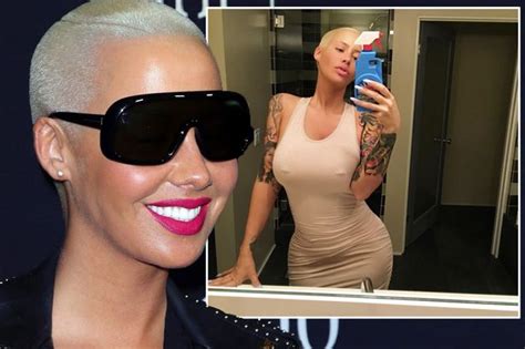 Amber Rose Shows Off Double Nipple Piercing In Sexy Braless Instagram