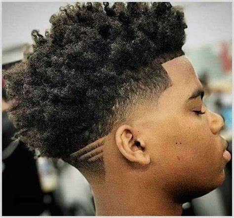 In this picture, you can see how the tight sides slowly graduate to textured top, finishing the look with a sense of. 10 Taper Fade with Designs That'll Be Huge in 2021