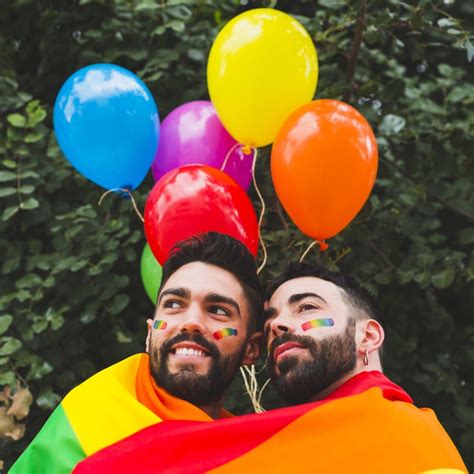 Happy Gay Couple With Lgbt Balloons Hugging In Garden Free Photo Nohat Free For Designer
