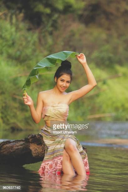 Woman Bathing In The River Photos And Premium High Res Pictures Getty Images