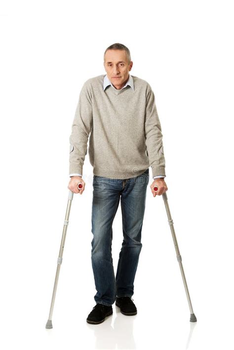 Full Length Mature Man With Crutches Stock Photo Image Of Patient