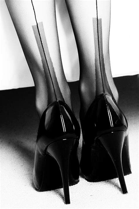 classic black stilettos and stockings a must have for those nights out with someone special