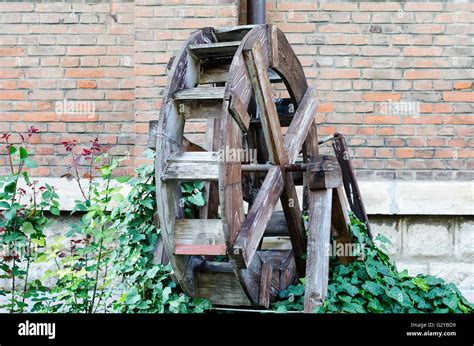 Wooden Wheel Of An Old Water Mill Stock Photo Alamy