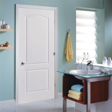 I recently purchased some masonite doors by looking at photos on the manufacturer's web site. Masonite 30 in. x 80 in. 2-Panel Arch Top Left-Handed ...