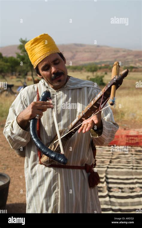 Traditional Moroccan Folk Fiddle Player And Singer Performs At An