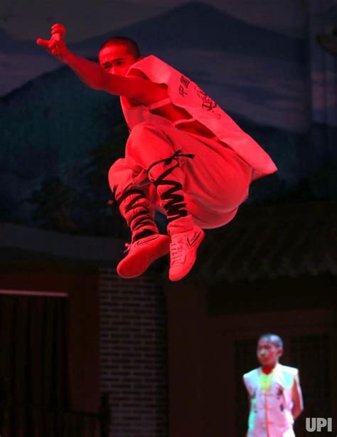 Photo Shaolin Kung Fu Monks Perform For A Crowd In Sanmenxia China