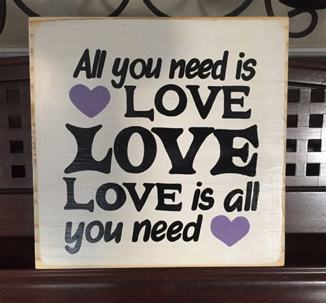 Enough to get you through the hard times that tend to show up for all of us from time to time in our lives. All you Need is Love Sign Plaque The Beatles Song Lyrics Quote