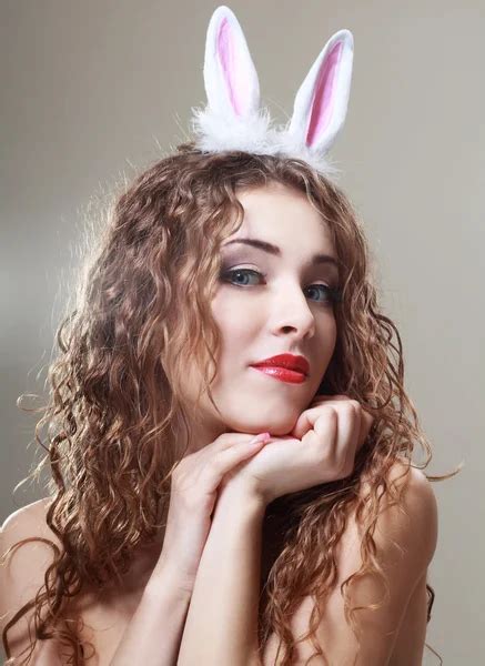 Sexy Woman With Bunny Ears Blowing A Kiss Smiling Easter Blonde