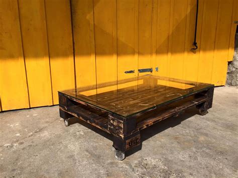 Measures 19 h x 48 w x 29 d overall. DIY Pallet Coffee Table with Glass Top & wheels