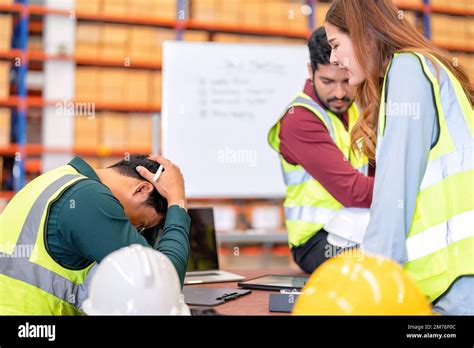 Group of worker in the warehouse factory conduct toolbox talk daily