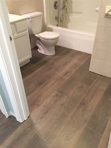 Engineered Hardwood Installed In A Bathroom By Hampton Flooring Center