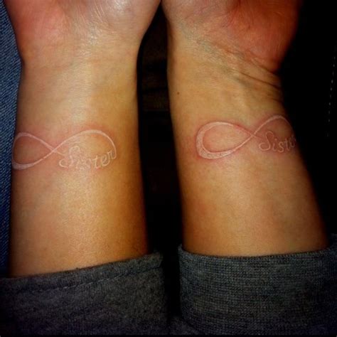An infinity arrow tattoo stamped on your wrist will instantly make an impression. Matching sister tattoo. So cute! | Cute ink | Pinterest ...