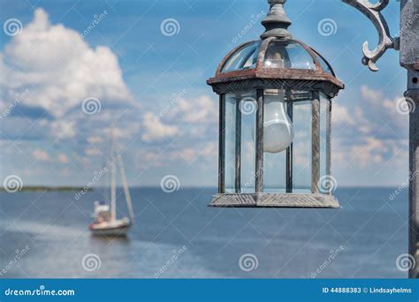 Lamp Post With Light Bulb By The Ocean Stock Image Image Of