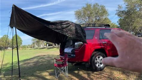 Toyota 4runner Diy Awning Using 10x10 Aqua Quest Defender Tarp With Green Elephant Telescoping