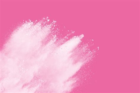 Premium Photo White Powder Explosion On Pink Background