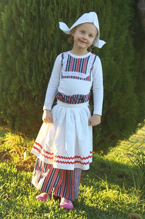 home made little dutch girl costume for our cultural costume day at school long stripey skirt