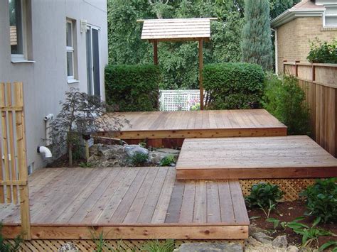 Japanese Garden Tiered Deck With Japanese Entrance Way Backyard
