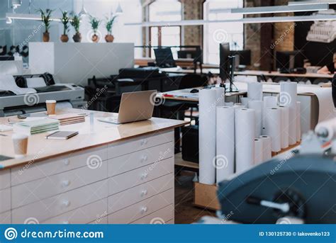 Pleasant Working Atmosphere At Spacious Light Office Stock Photo