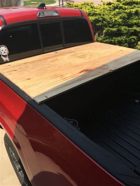 Using a retractable tonneau cover can help prevent anyone from getting into your truck bed and taking your belongings. DIY tonneau cover | Tacoma World