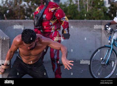 Seattle, USA. 14 Jun, 2019. Late in the day Superhero pedicab drivers