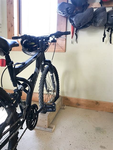 It is much easier to get a couple of bikes on this rack. Easy DIY Bike Rack | 10 Minute DIY - Twelve On Main