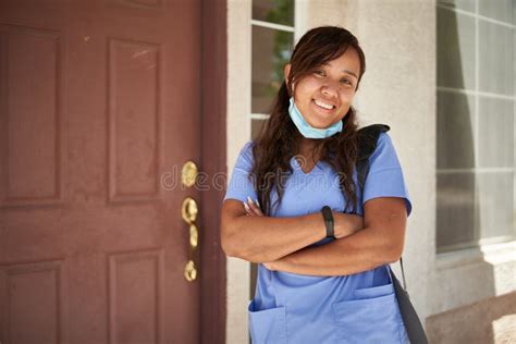 Happy Filipina Nurse Portrait In Front Of House Stock Image Image Of