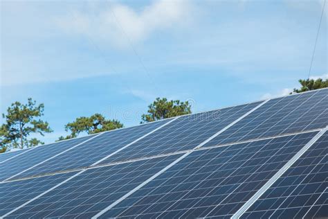 Blue Solar Panel With Wind Turbine On Blue Sky Stock Image Image Of