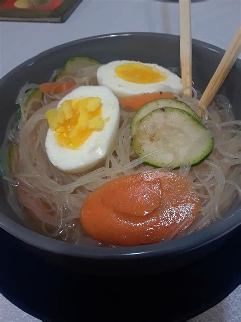 Drain water and stir seasoning packet and parsley into noodles. First time adding egg to my ramen. Tasted better than ...