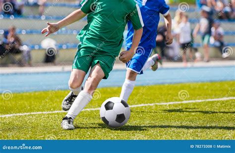 Soccer Players In Action Football Players Running On The Field Stock