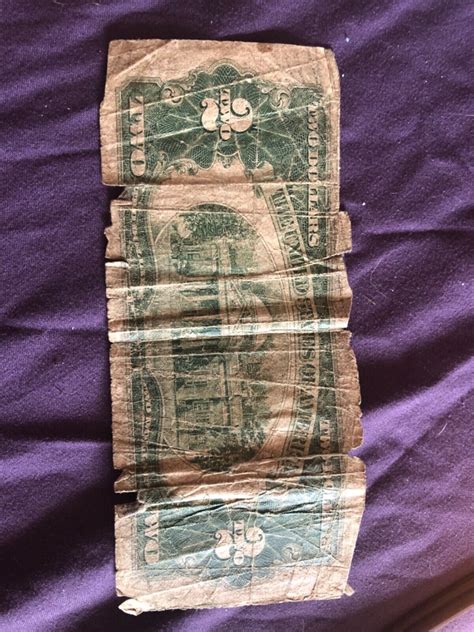 1928 g series red seal 2 dollar bill / 1957 silver certificate 1 dollar