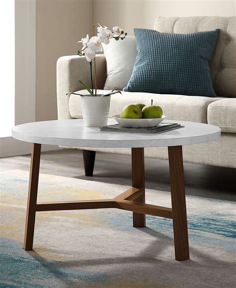 Round white/heather gray solid wood dining table this solid wood white/heather gray dining this solid wood white/heather gray dining table from international concepts is perfect for small spaces whether it be a kitchen or a studio apartment. Walker Edison 30 inch Round Coffee Table in Faux White ...