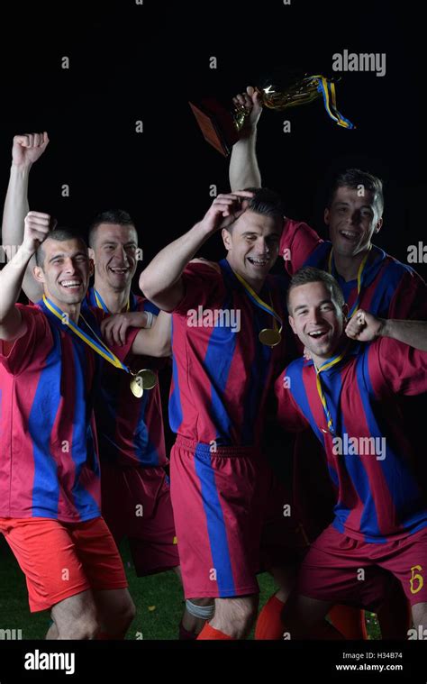 Soccer Players Celebrating Victory Stock Photo Alamy