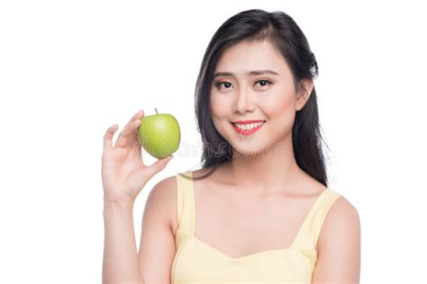 Pretty Young Asian Woman Holding Fresh Apple Isolated On White B Stock