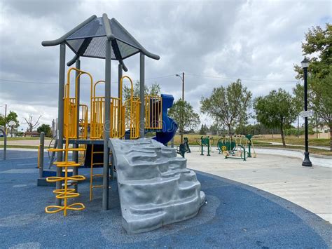 Children Playground Activities In Public Park Slide Swing On Modern