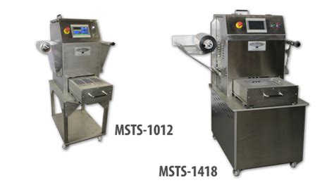 The machine sets 2 x 5 = 10 tetra packs per tray. Manual Shuttle Film to Tray Food Packaging Machines