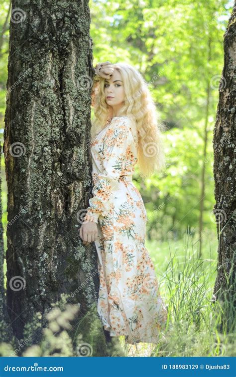 Picture Of Blonde Girl With Curly Hair In The Forest Stock Image Image Of Attractive Blond