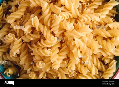 Raw Wheat Golden Spiral Pasta Texture Macro Top View Stock Photo Alamy