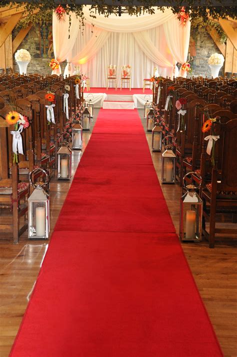 Red Carpet Aisle Runner At A Colorful Wedding Reception