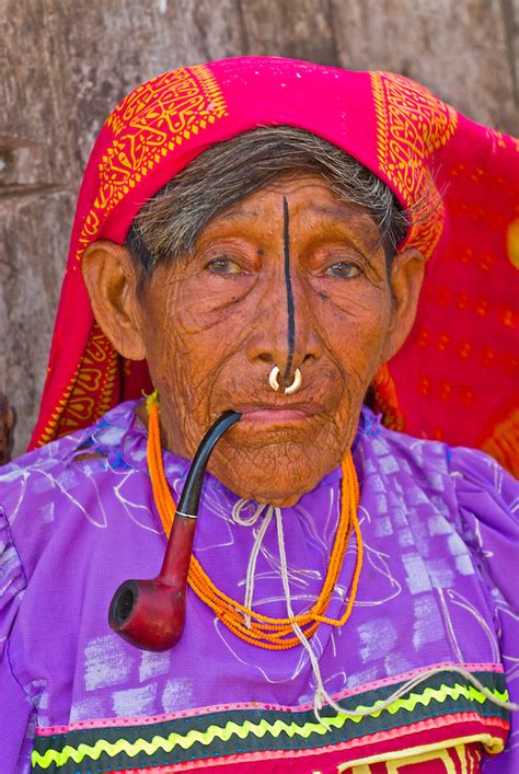 Kuna Indian Woman With Nosering Smoking A Pipe Wearing Native Costume