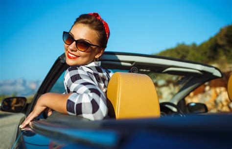 Beautiful Pin Up Woman Sitting In Cabriolet Enjoying Trip On Lu Stock