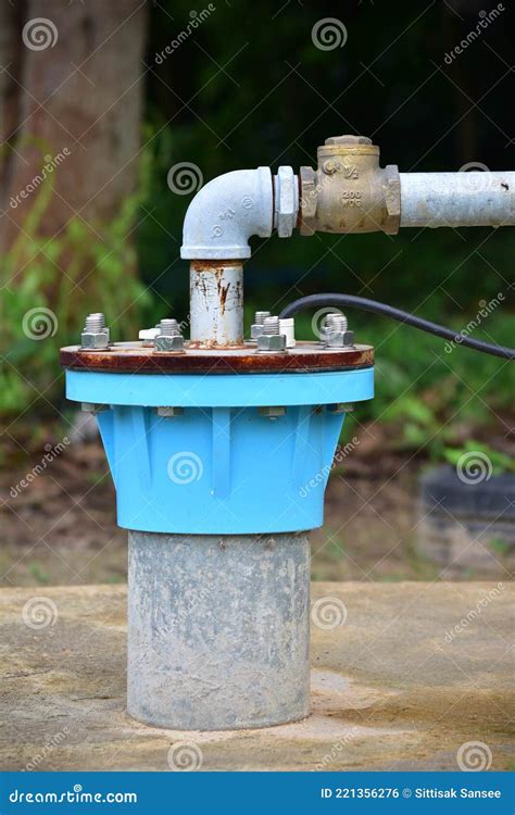 The Water Flowing Artesian Well From The Land Install The Pump Stock