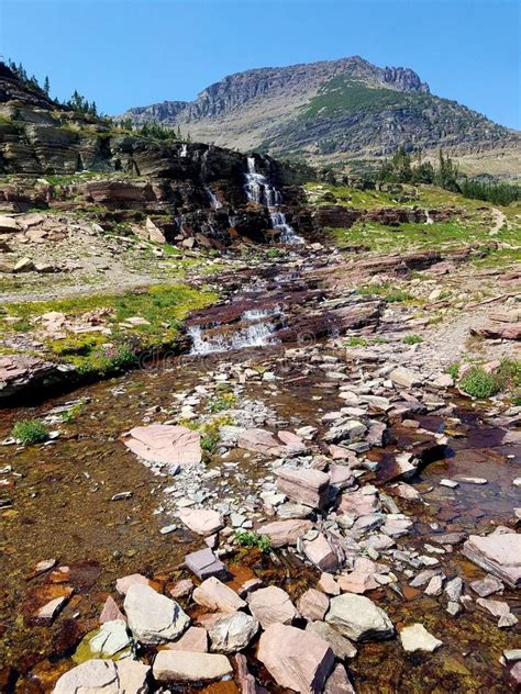 4k Amazing Rocky Mountain Glacier Stream Waterfall In The Summer With