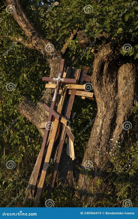 Stack Of Christian Wooden Crosses With The Crucifixion Of Jesus Christ