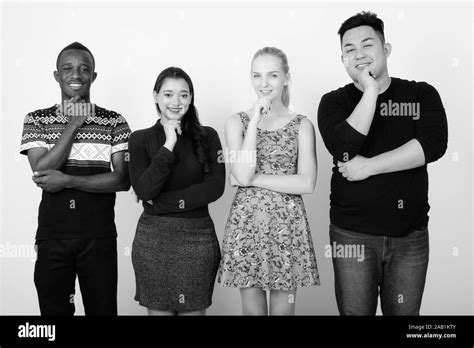 Studio Shot Of Happy Diverse Group Of Multi Ethnic Friends Smiling And